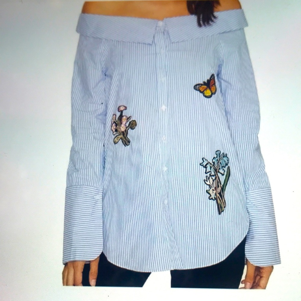 Romeo and Juliet Couture size M off shoulder shirt